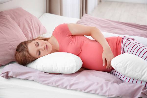 для профилактики болей в пояснице при беременности нужно выделять время для отдыха днем